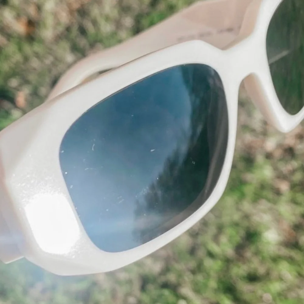 Prada White Frame Sunglasses with Dark Lenses